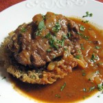 Chicken thigh on tahdig with butter sauce